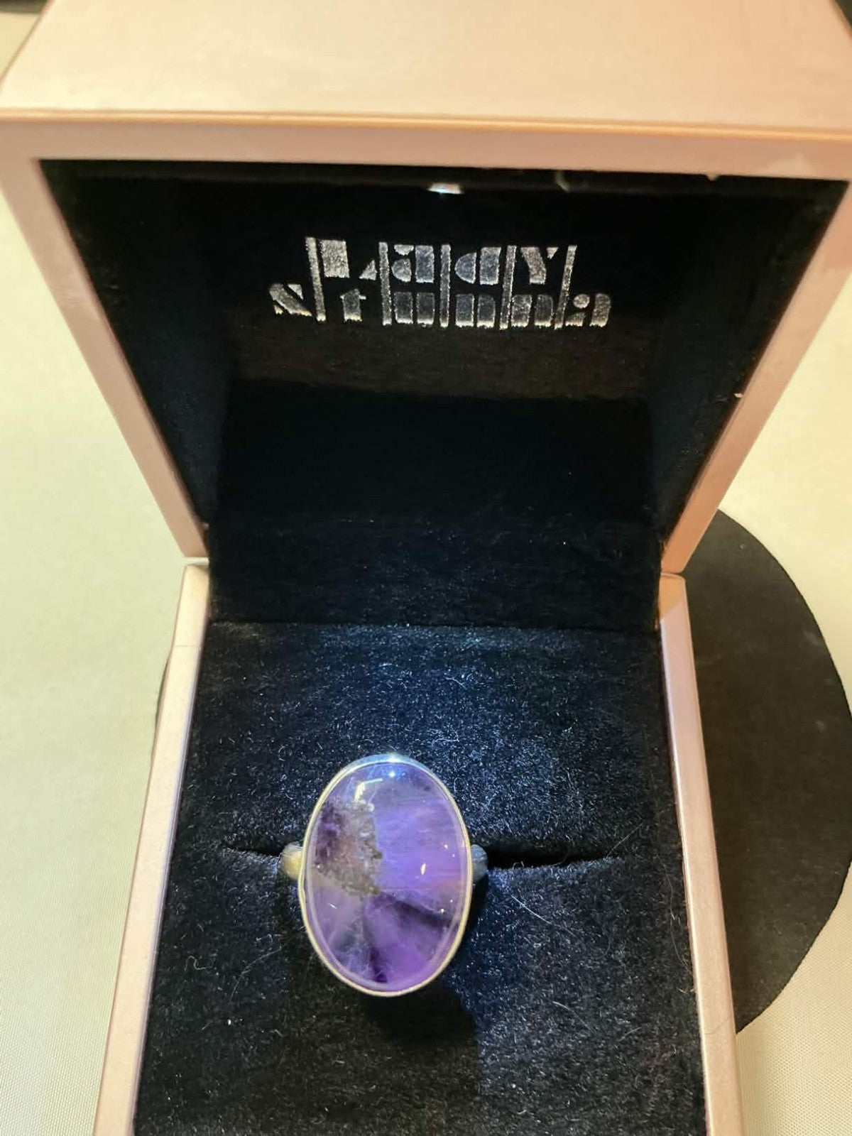 oval-cut amethyst gemstone ring,