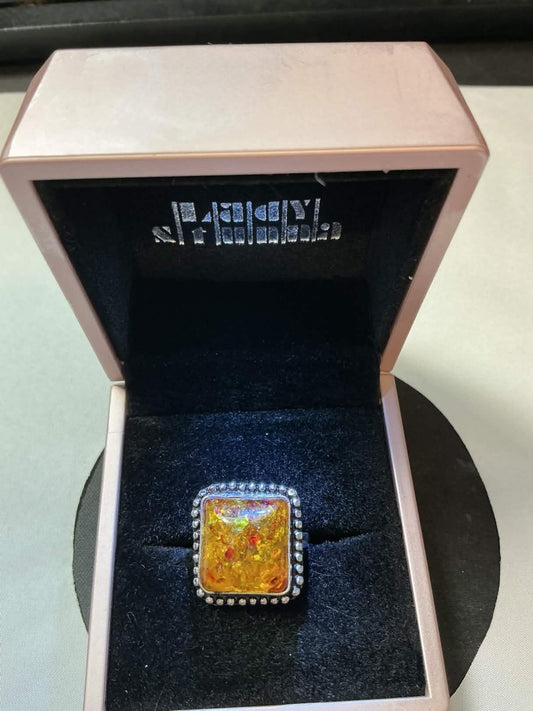 sterling silver amber ring, likely featuring a natural amber stone set in a 925