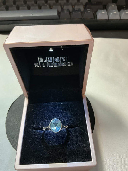 val-cut blue aquamarine or topaz ring set in silver