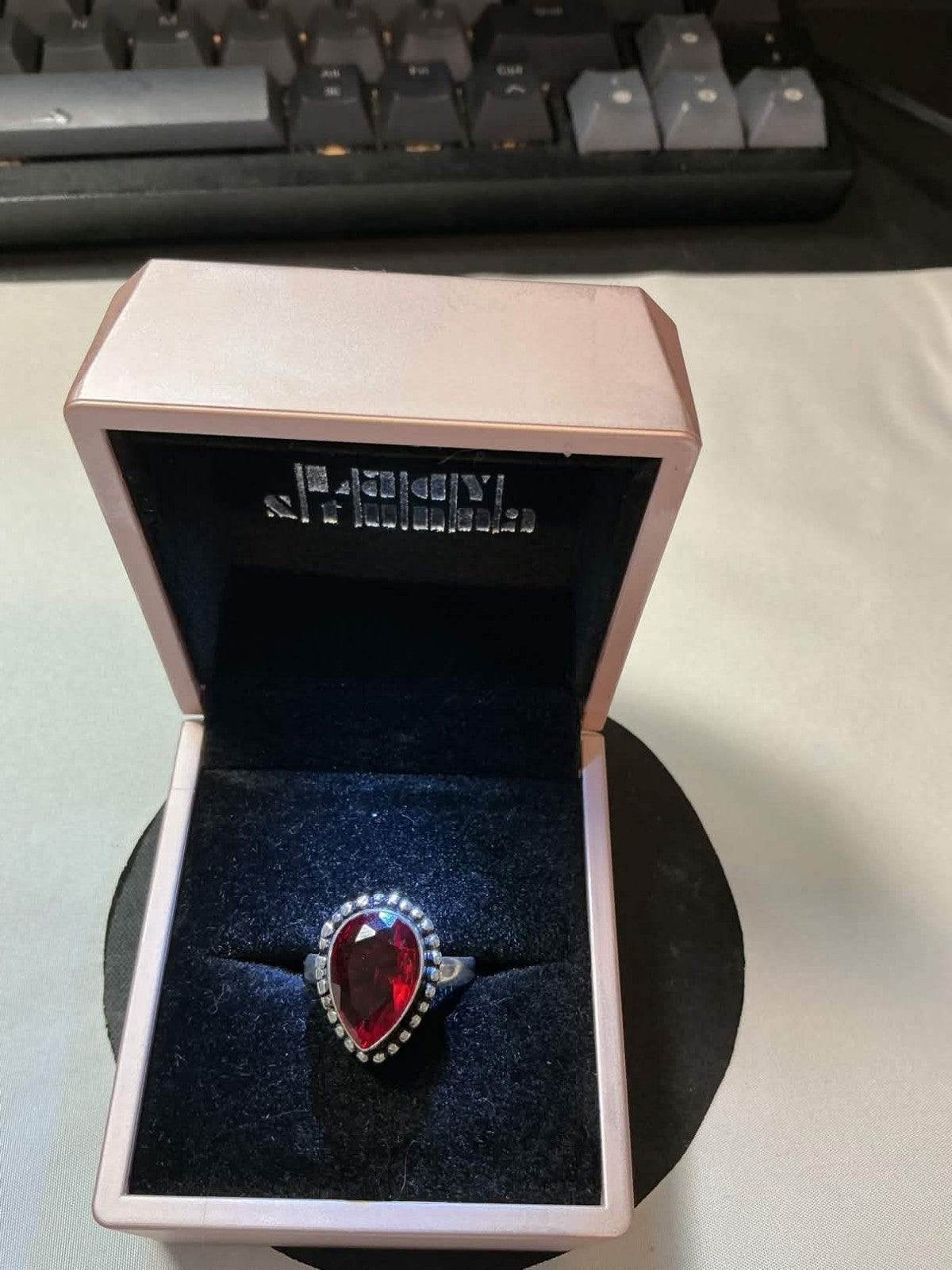 teardrop-shaped sterling silver garnet