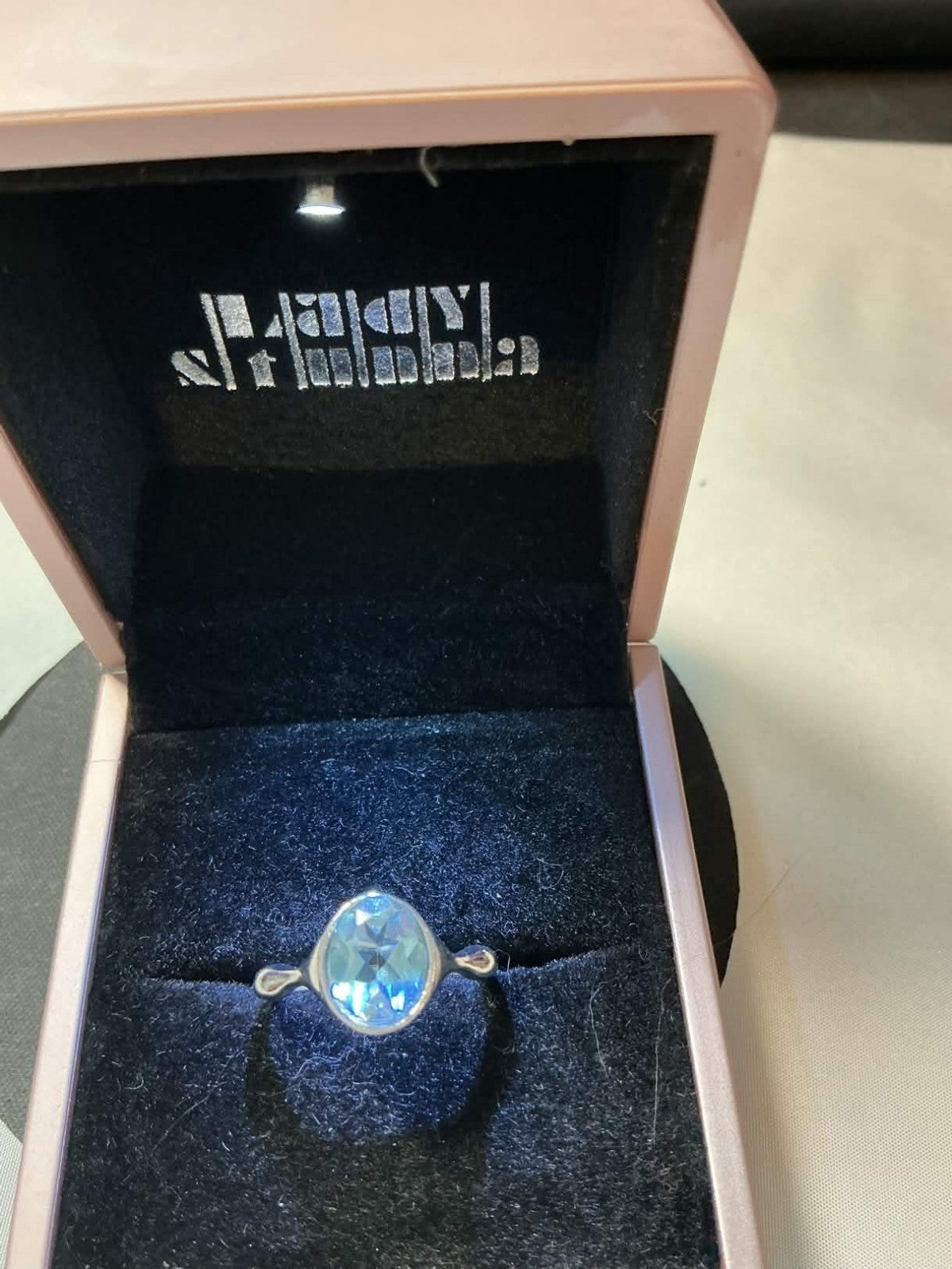val-cut blue aquamarine or topaz ring set in silver
