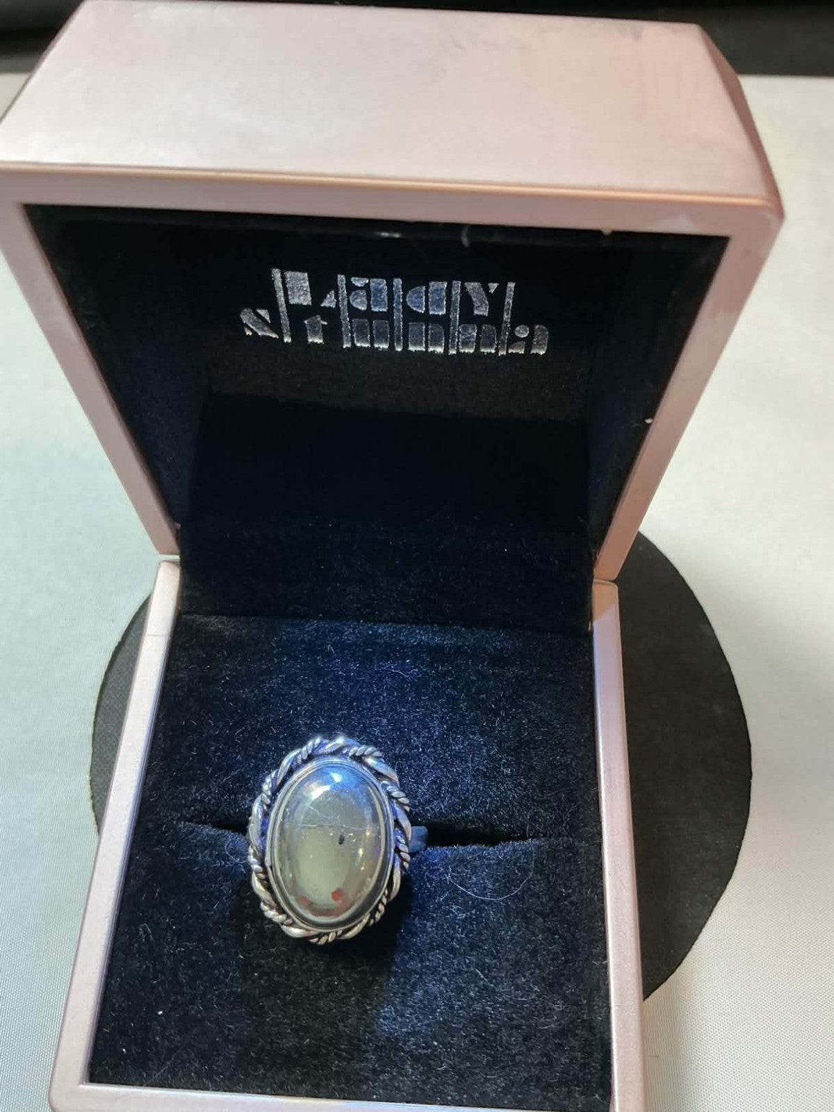sterling silver ring featuring a stone similar in appearance to Prehnite
