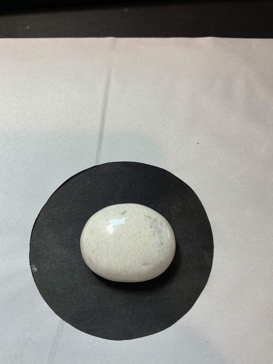 Scolecite, a white hydrated calcium silicate mineral