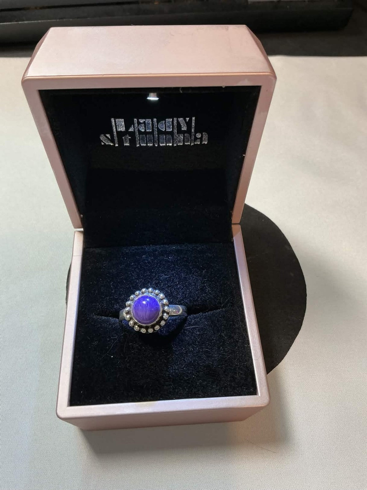purple amethyst cabochon ring set in sterling silver