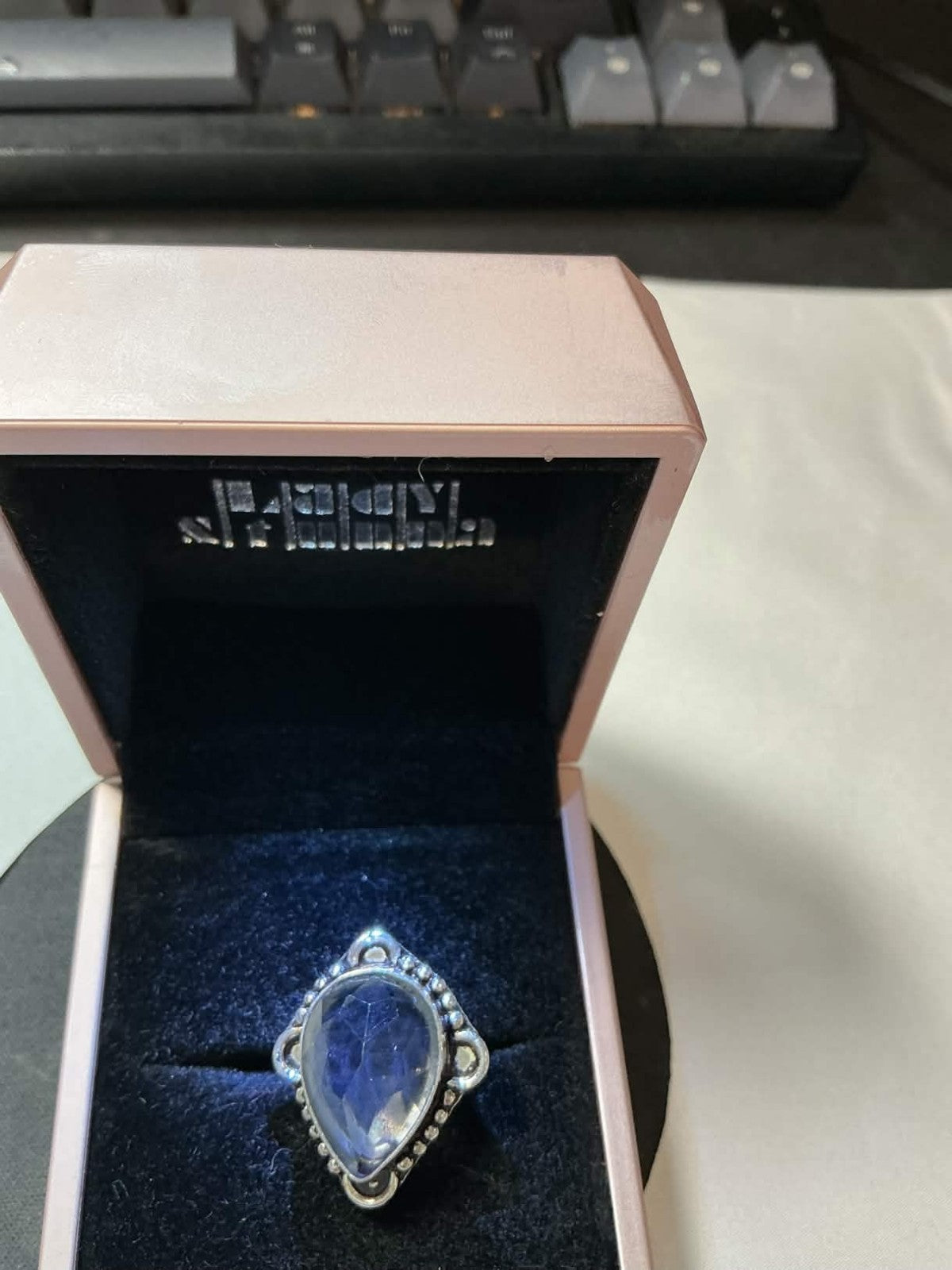 rainbow moonstone ring features a bohemian-style teardrop design set in sterling