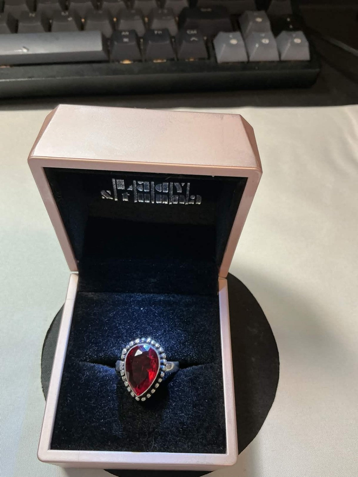 teardrop-shaped sterling silver garnet