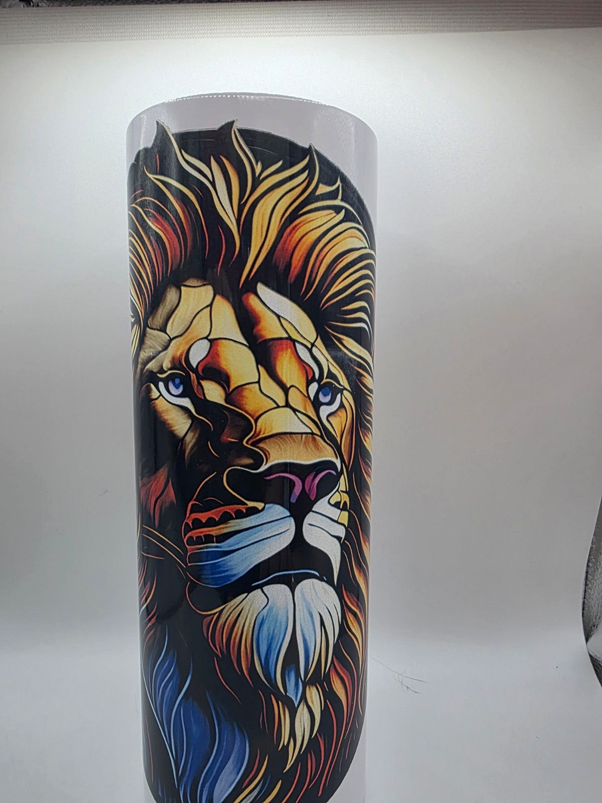 20 Ounce Metal Tumbler with lid and straw and box Lion