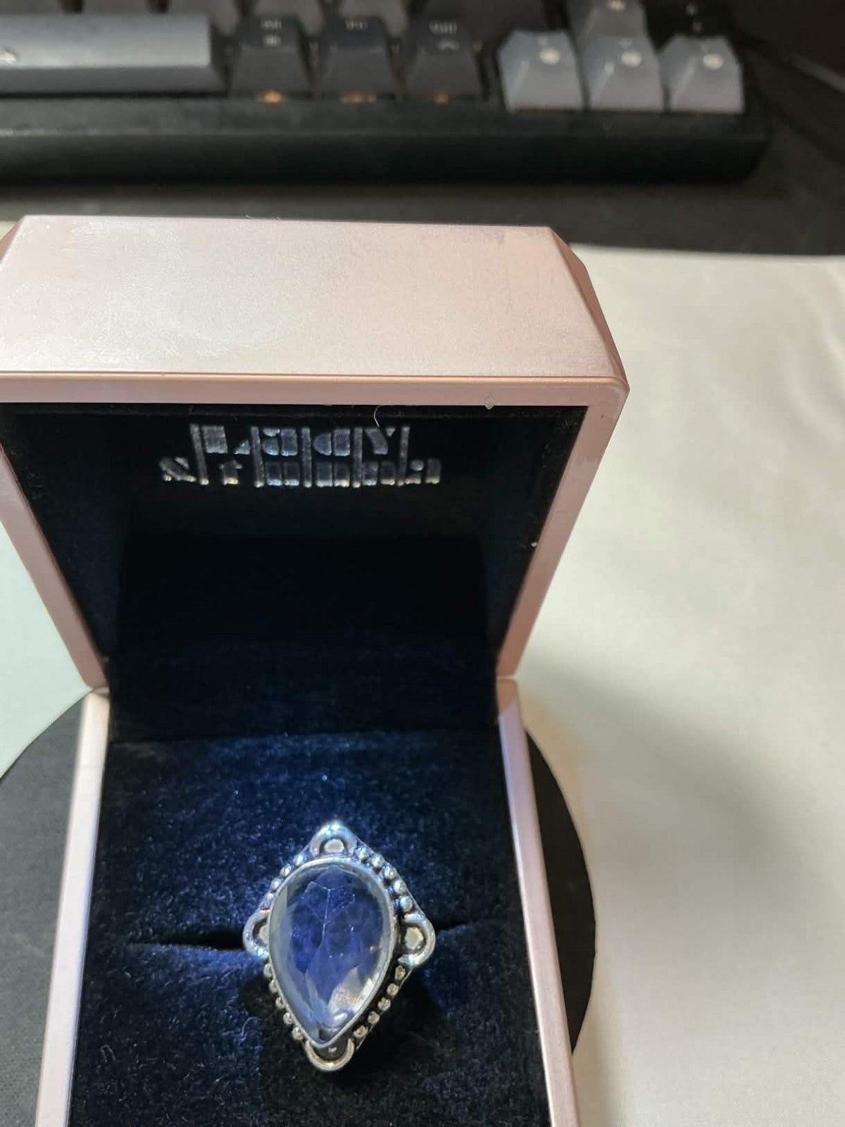 rainbow moonstone ring features a bohemian-style teardrop design set in sterling