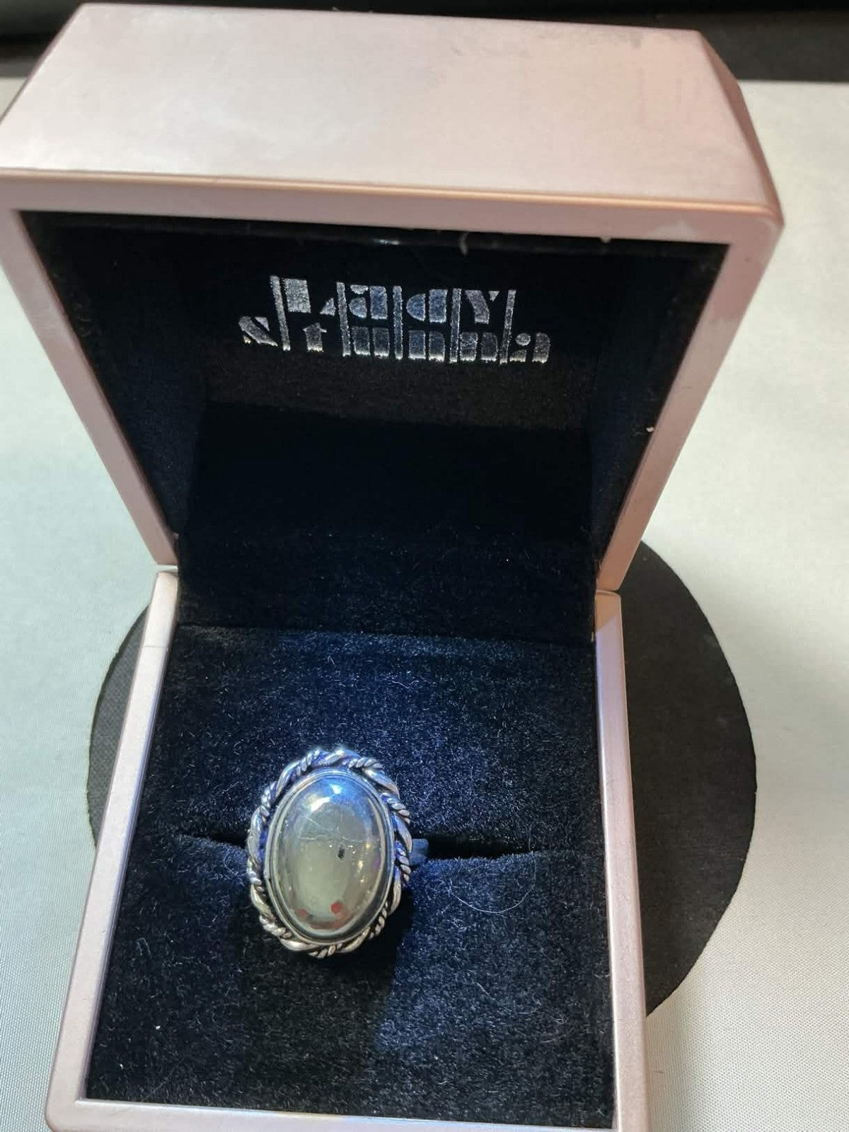 sterling silver ring featuring a stone similar in appearance to Prehnite