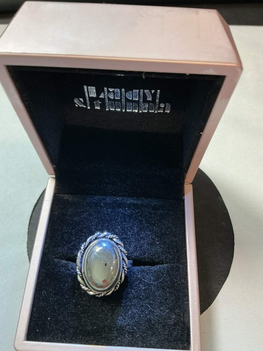 sterling silver ring featuring a stone similar in appearance to Prehnite