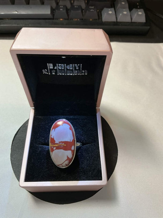 sterling silver ring features an oval Noreena Jasper gemstone.