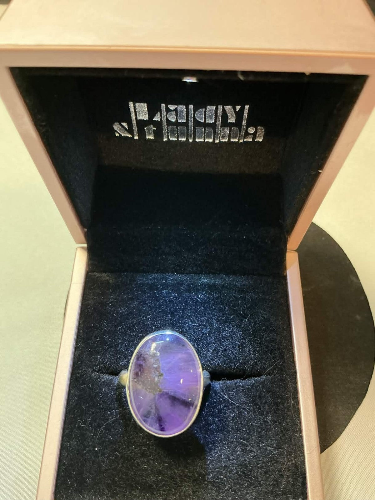 oval-cut amethyst gemstone ring,